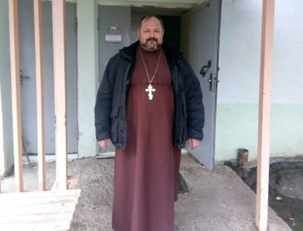 Священник на байке